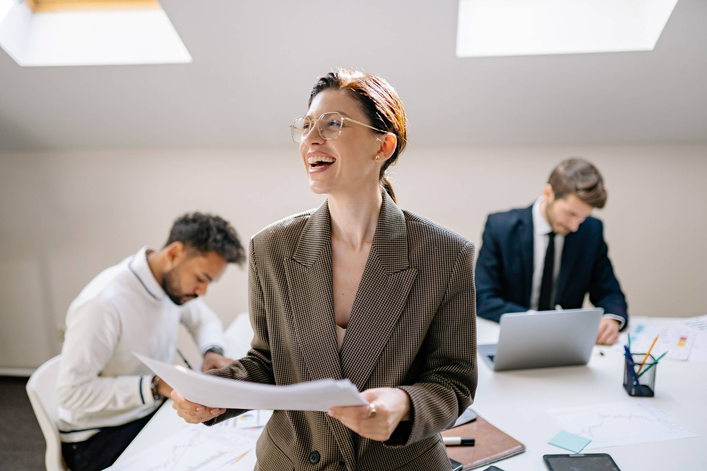 A lady smiling in her office